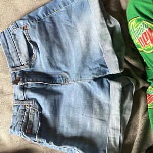 Blue jeans with roles on the bottom